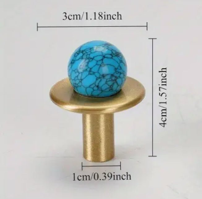 Elegant knop i messinglook - Grebet