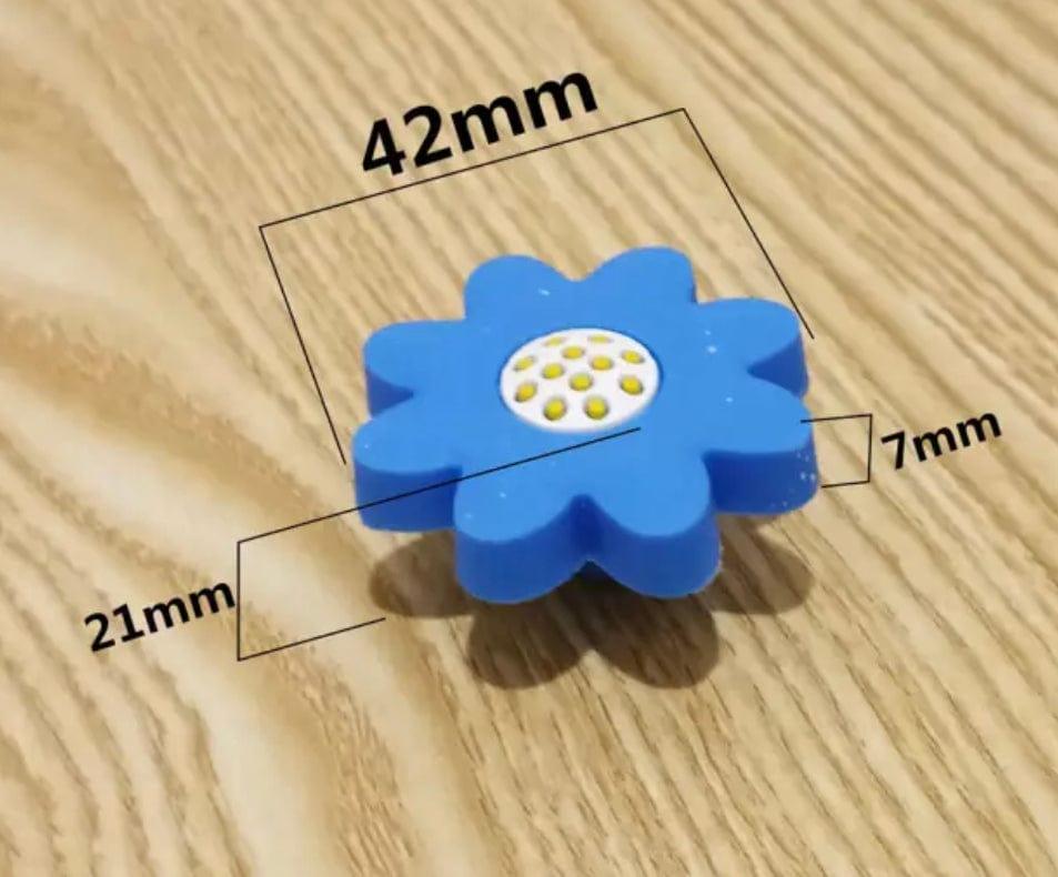 Blå blomster greb i gummi (Ø: 4 cm) - Grebet