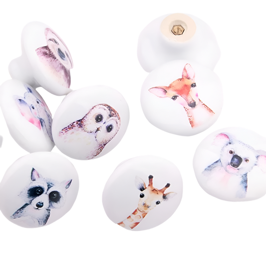 Keramik greb til børneværelset med dyremotiver (Ø: 38 mm)