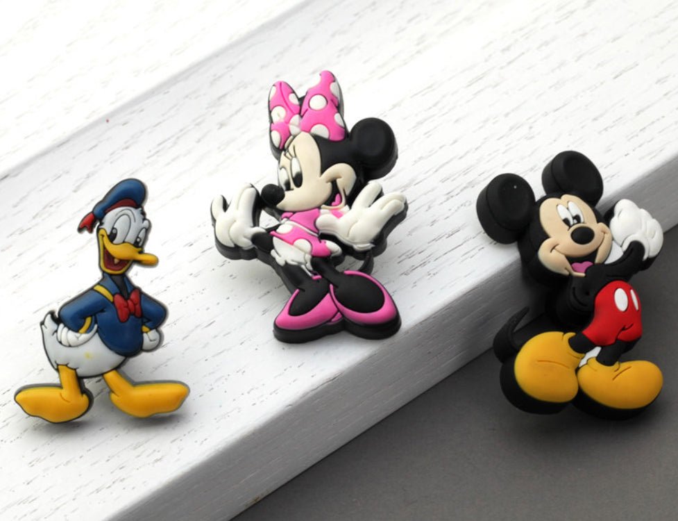 Disney figurer (Mickey, Minnie eller Anders And) - Grebet