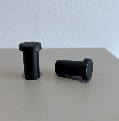 Sorte letvægtsknager i minimalistisk design - Grebet