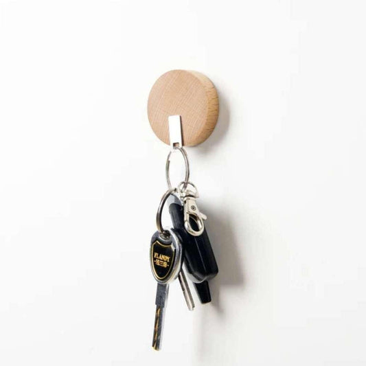 Magnet beklædt i lyst træ (Ø: 5 cm) - Grebet